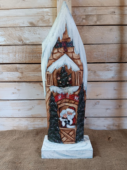 Hand-Painted Gingerbread House with Mr. and Mrs. Claus and Garlands (21in)